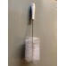 Bulk outlet brush